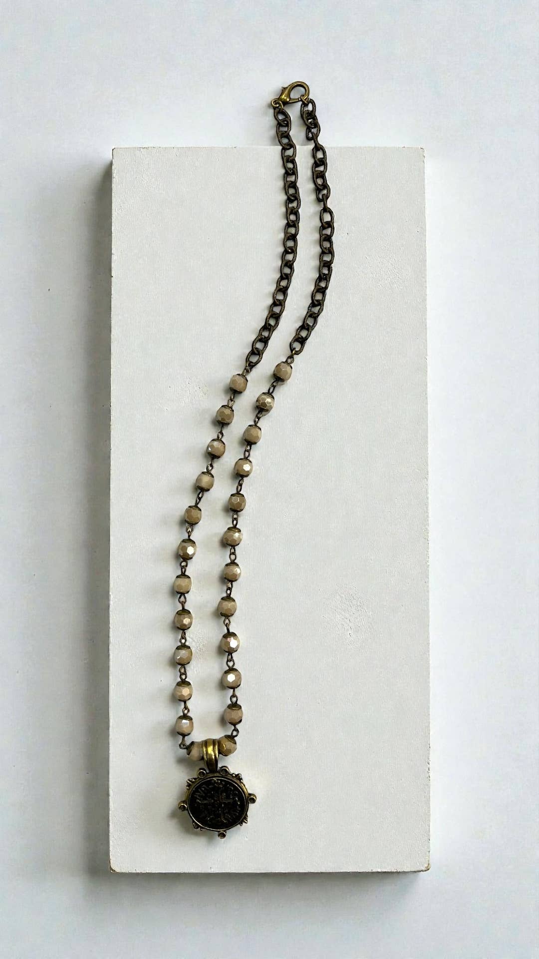 20” Necklace with relic coin on ivory 8mm and cable chain