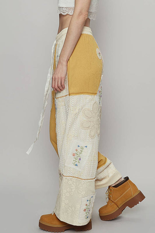 Solid lace patch detail woven pants