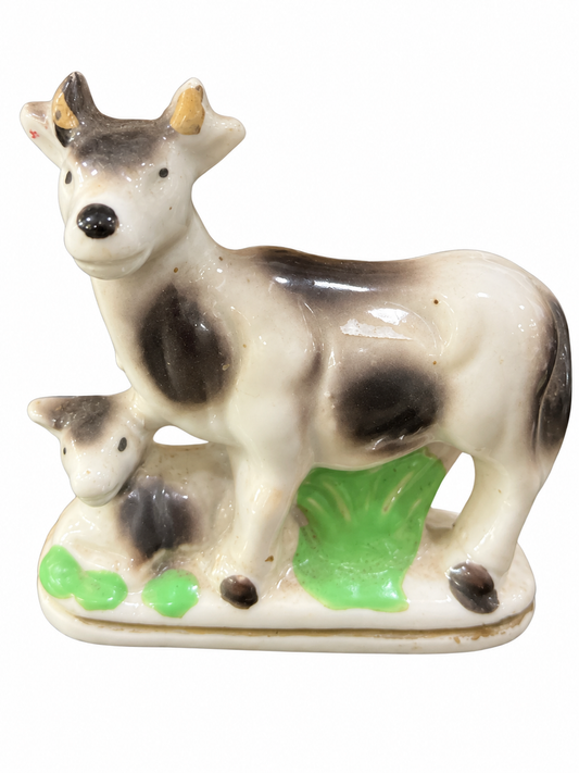 Vintage mini cow and calf figurine